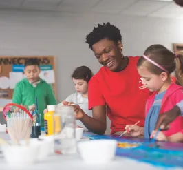 Kids and staff painting at Fundays