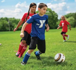 Kids playing youth soccer at the Y