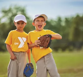 2 boys playing baseball at the YMCA