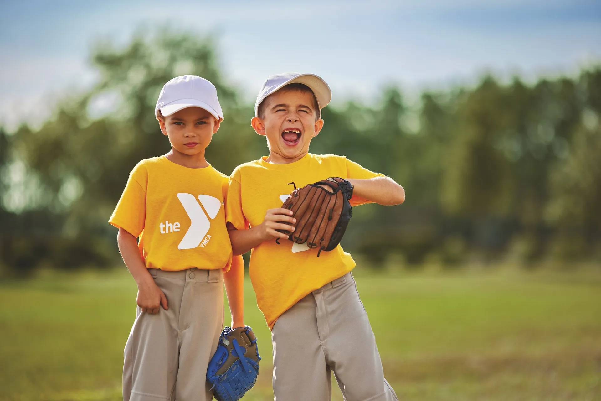 2 boys playing baseball at the YMCA